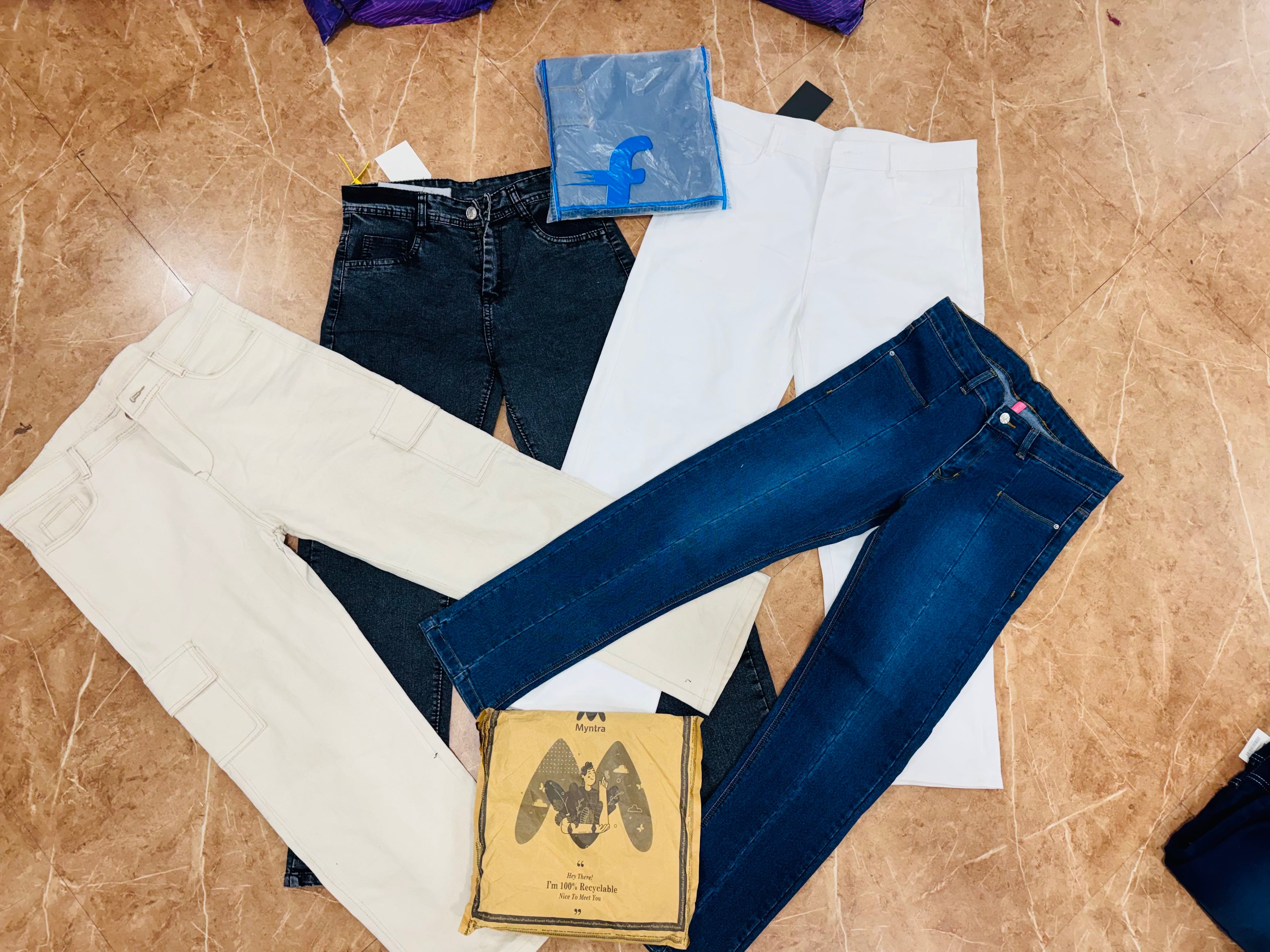 Girls baggy jeans and slim fit jeans assortment stock